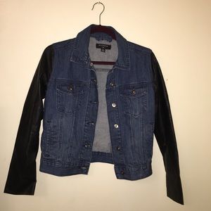 Jean jacket with leather sleeves